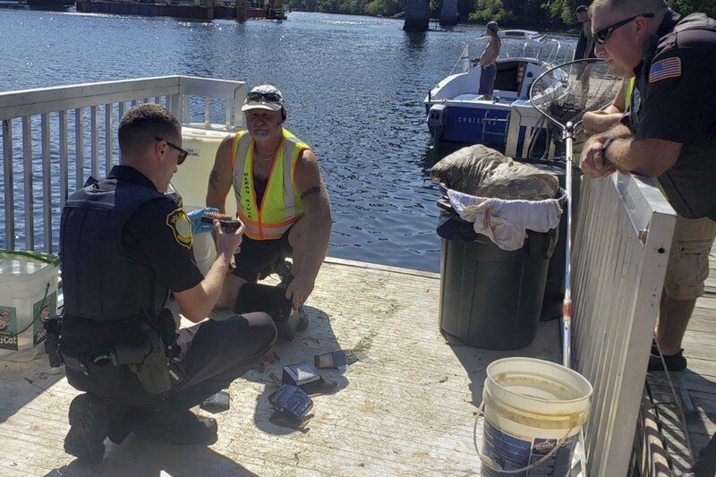 Boxes of bullets discovered at edge of river